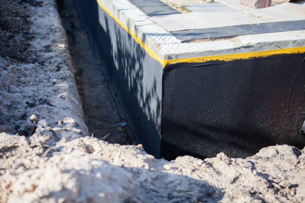 Professional Emergency Waterproofing technician working in Bannister, MI